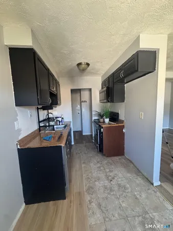 a room with furniture and a window