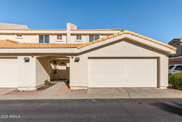 a view of a house with a garage