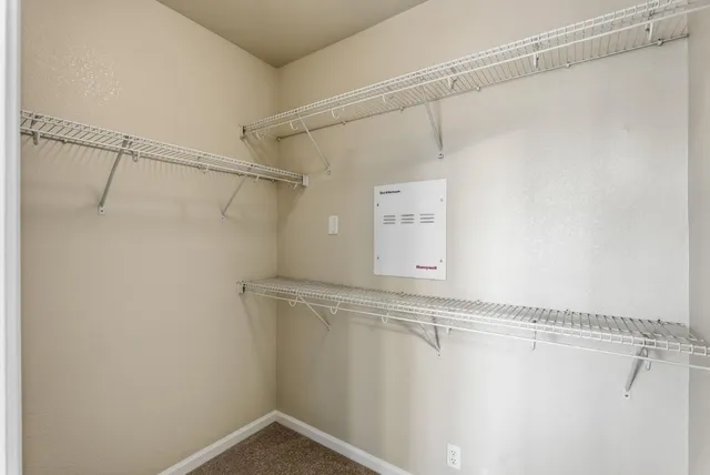 a view of a room with racks on the wall
