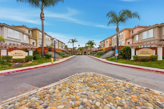 a view of a street with a building in the background
