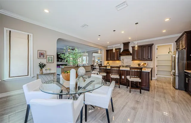 a living room with furniture fireplace and a flat screen tv