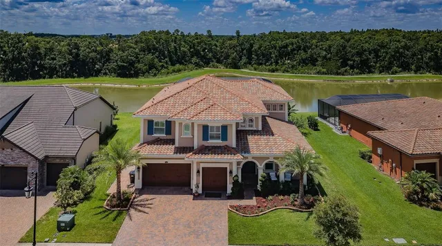 an aerial view of a house with a garden