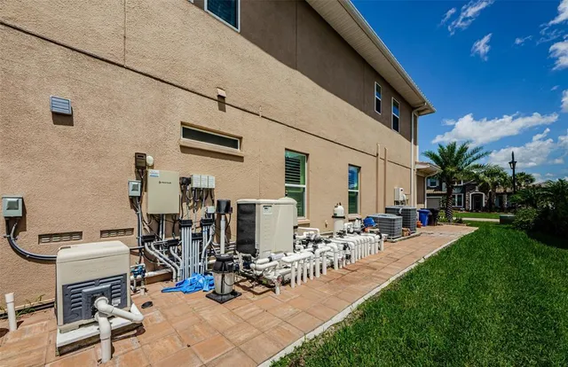 a spacious bedroom with a large bed and a large window