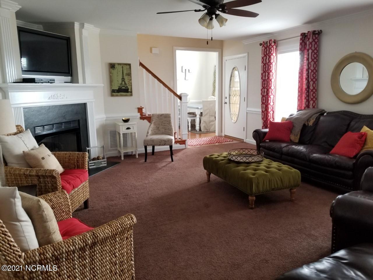 Great room with fireplace and gas logs