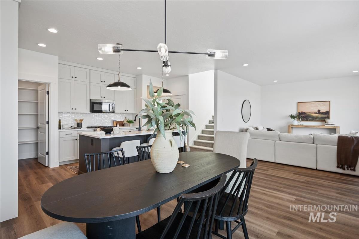 749 South Calhoun Lane Star, ID 83669 - Photo 13 of 34 Dining space featuring dark wood-style flooring and recessed lighting