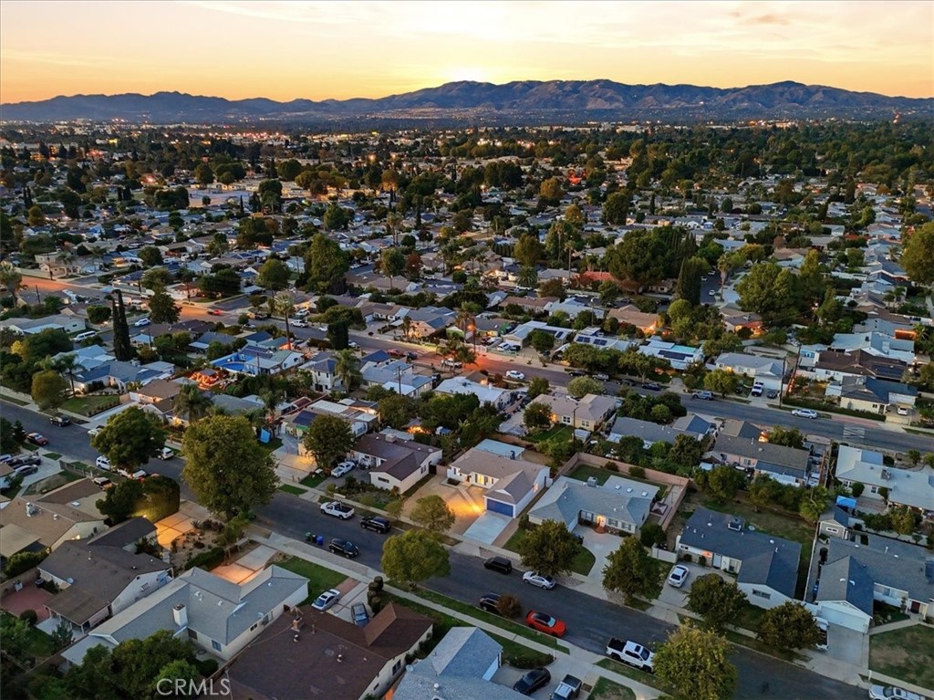 17751 Blythe Street Reseda, CA 91335 - Photo 3 of 23 an aerial view of residential houses with outdoor space