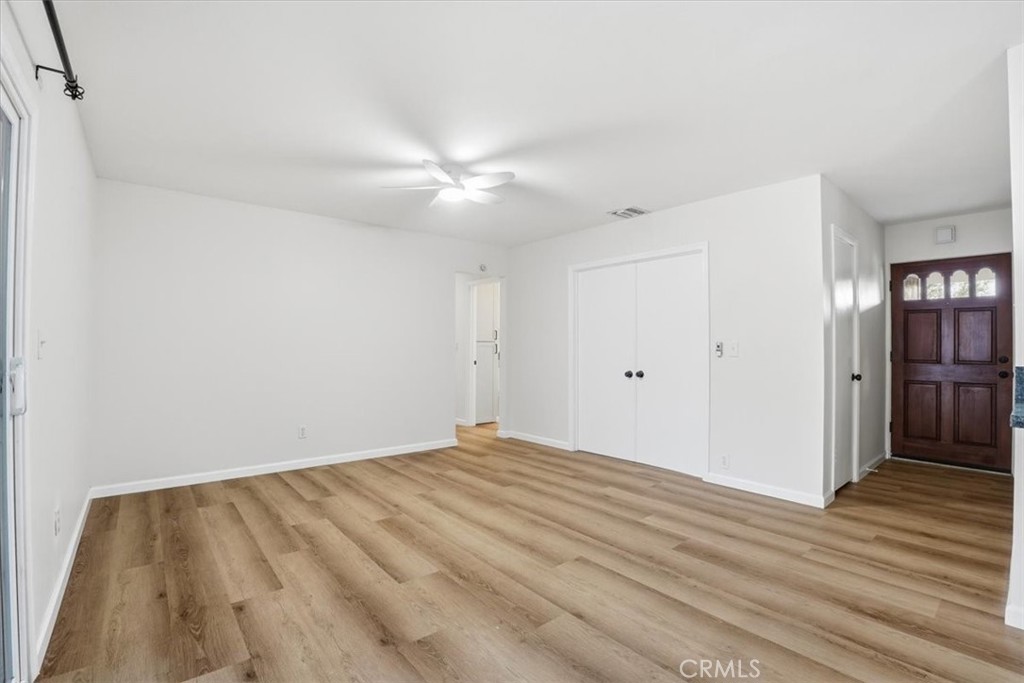 17751 Blythe Street Reseda, CA 91335 - Photo 10 of 23 a view of empty room with wooden floor