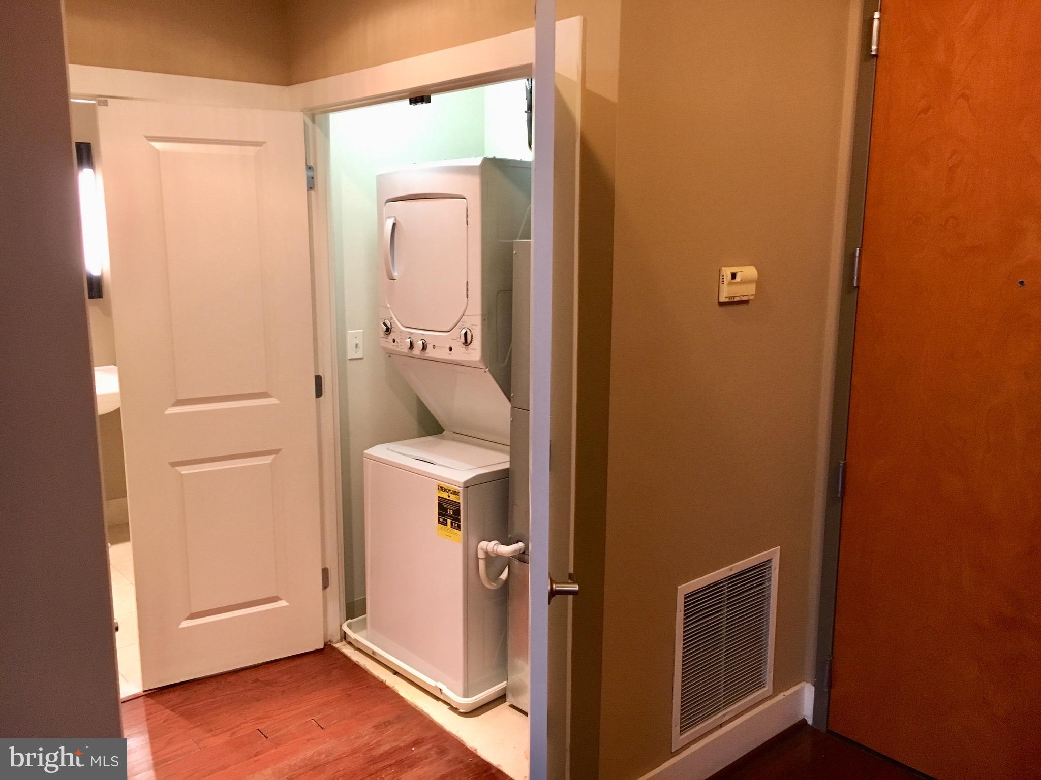 2301 Champlain Street Northwest, Unit 213 Washington, DC 20009 - Photo 12 of 40 a bathroom with a sink and vanity