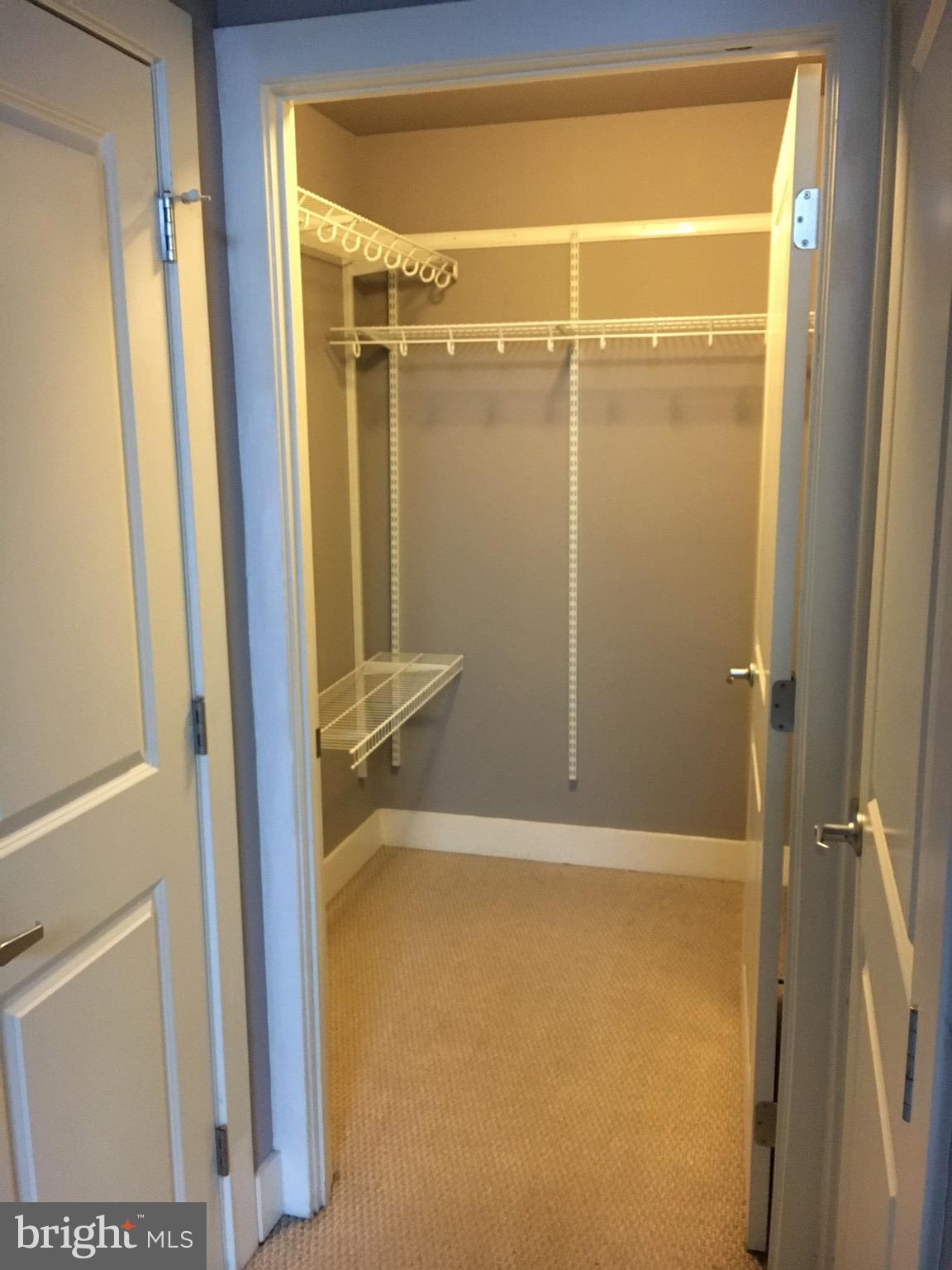 2301 Champlain Street Northwest, Unit 213 Washington, DC 20009 - Photo 17 of 40 a bathroom with a glass shower door