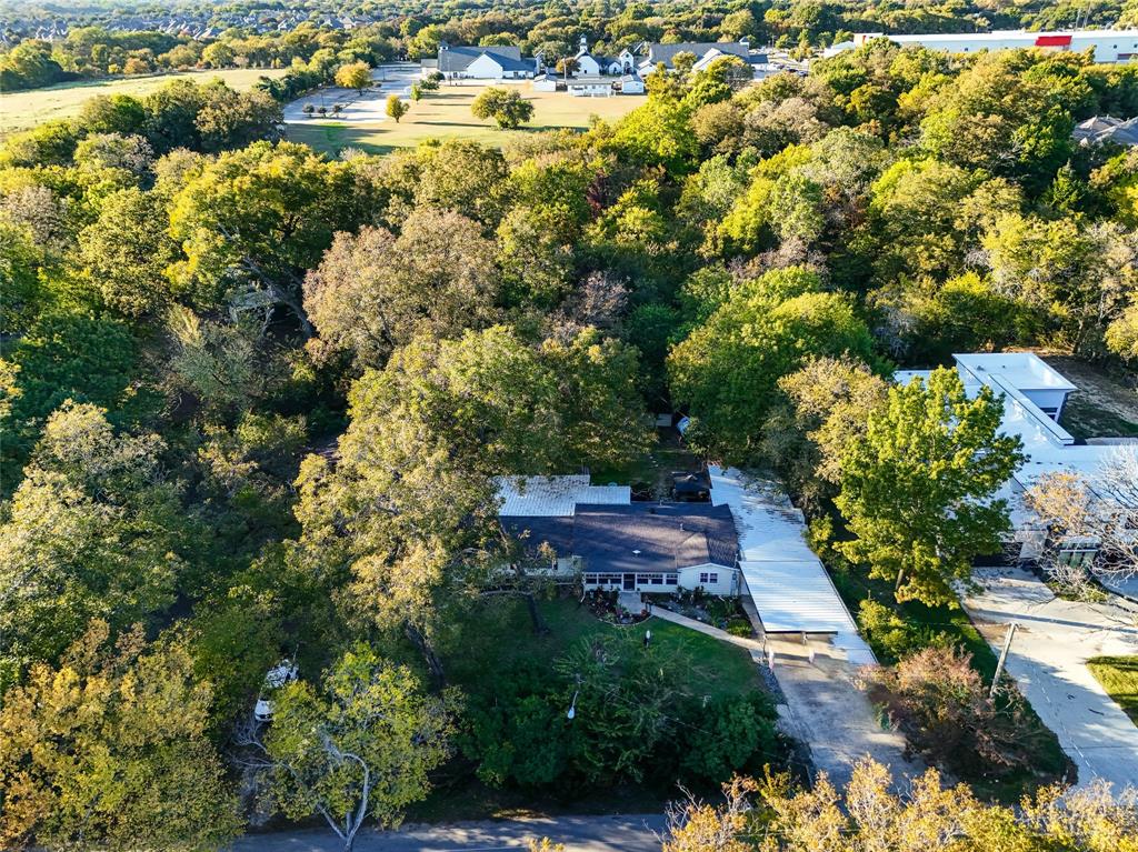 1641 Ben Davis Road Garland, TX 75040 - Photo 37 of 38 a view of a city with lush green forest