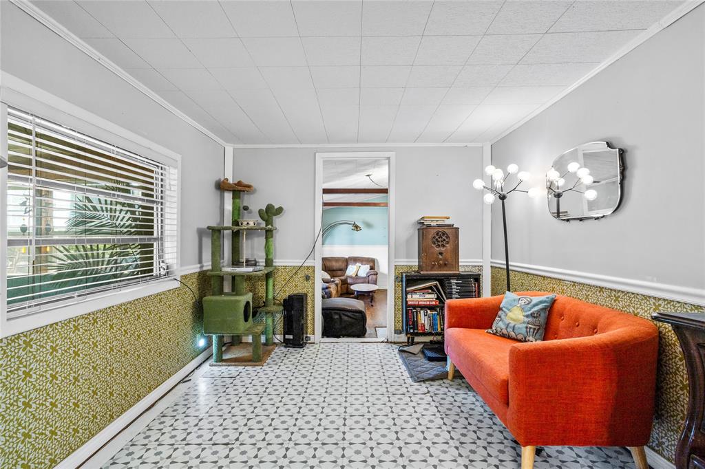 1641 Ben Davis Road Garland, TX 75040 - Photo 6 of 38 a living room with furniture and a window