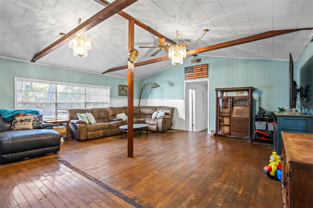 1641 Ben Davis Road Garland, TX 75040 - Photo 7 of 38 a living room with furniture and a flat screen tv
