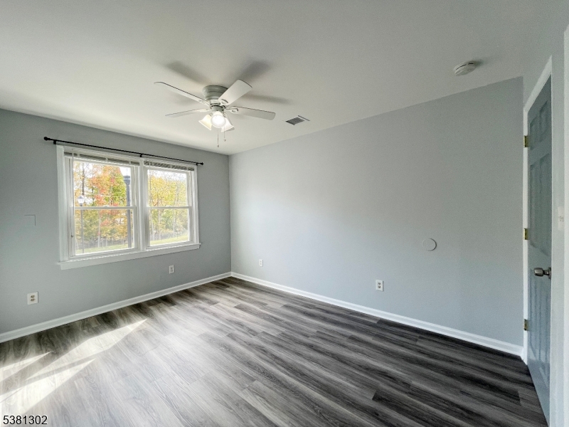 31 Lakeside Boulevard, Unit A Hopatcong, NJ 07843 - Photo 15 of 24 a view of an empty room with a window