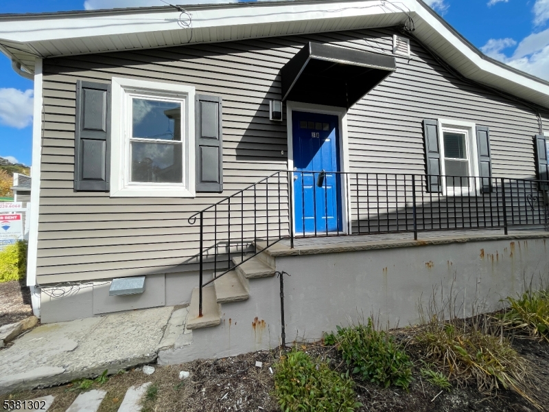 31 Lakeside Boulevard, Unit A Hopatcong, NJ 07843 - Photo 21 of 24 a view of a house with a garage