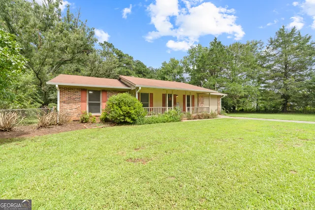 a house view with a garden space