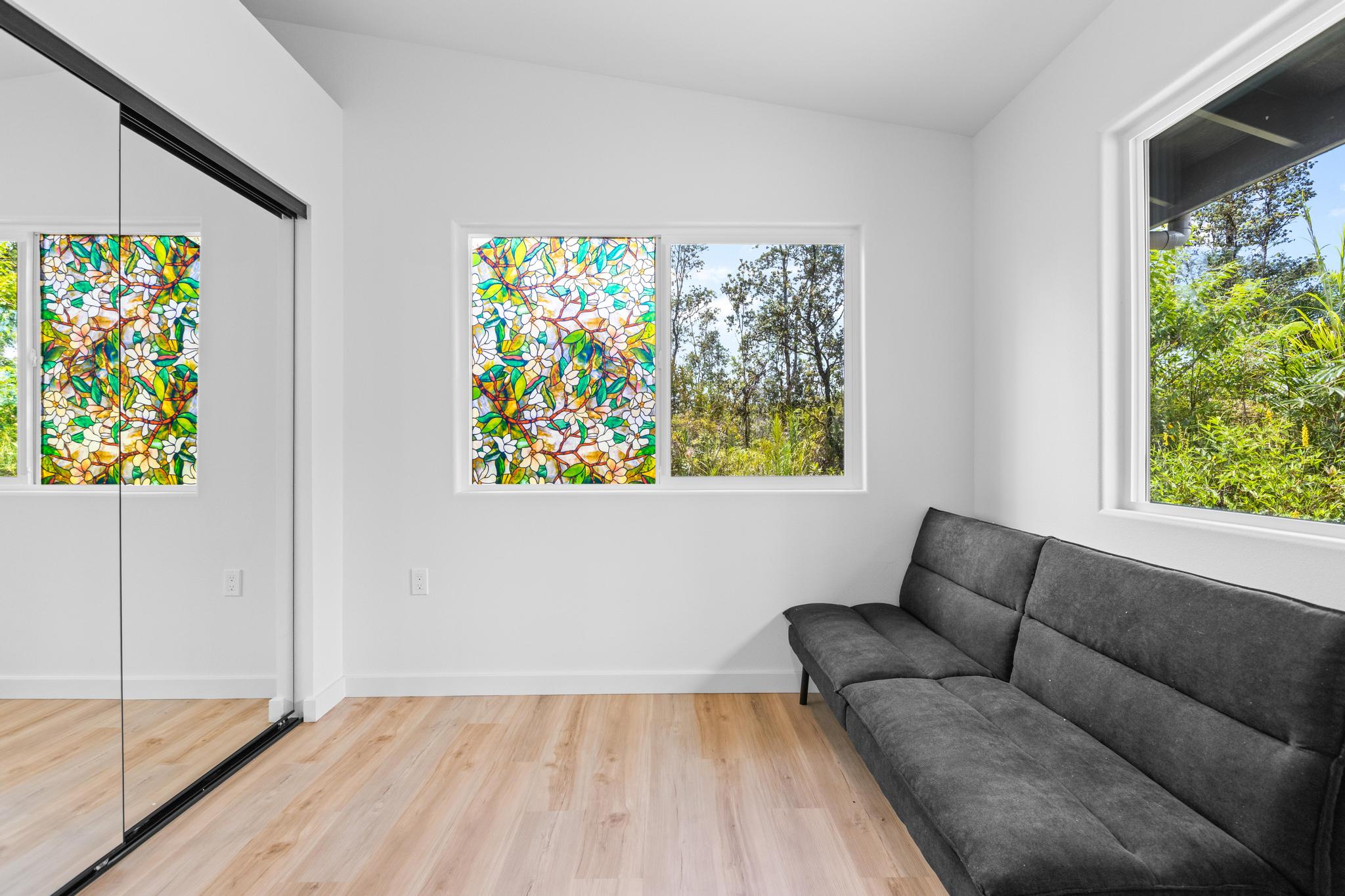 16-2075 Treefern Drive Pahoa, HI 96778 - Photo 15 of 24 a living room with furniture and a large window