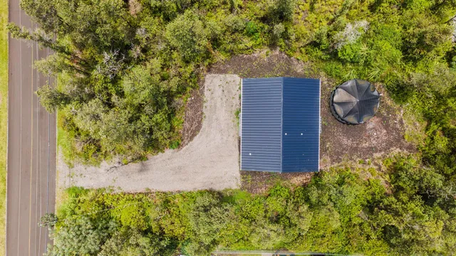 a view of a houses with a yard