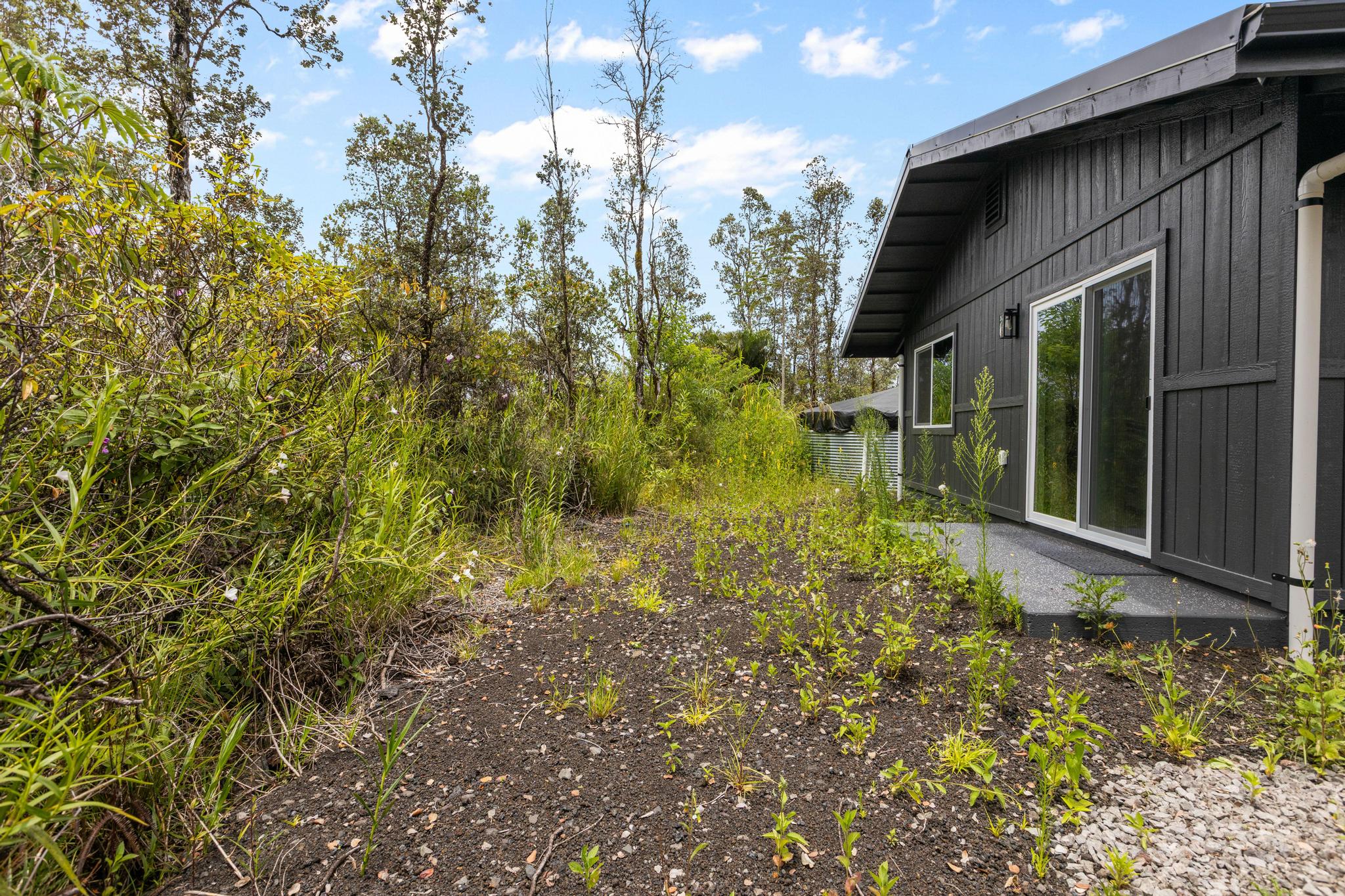 16-2075 Treefern Drive Pahoa, HI 96778 - Photo 20 of 24 a view of a house with a tree