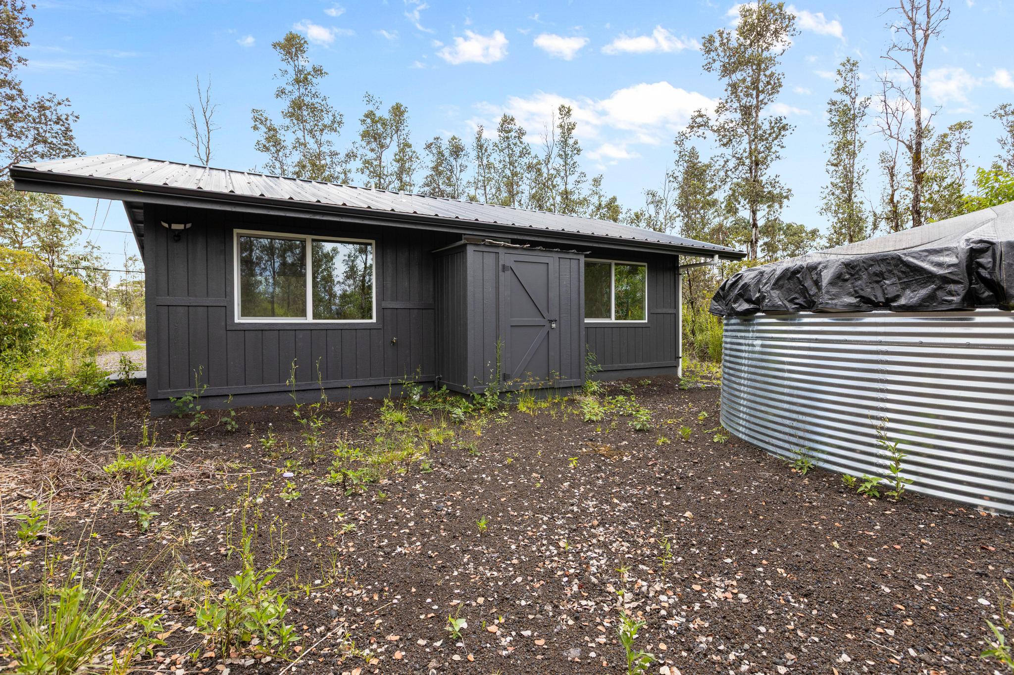 16-2075 Treefern Drive Pahoa, HI 96778 - Photo 23 of 24 a house view with a backyard space