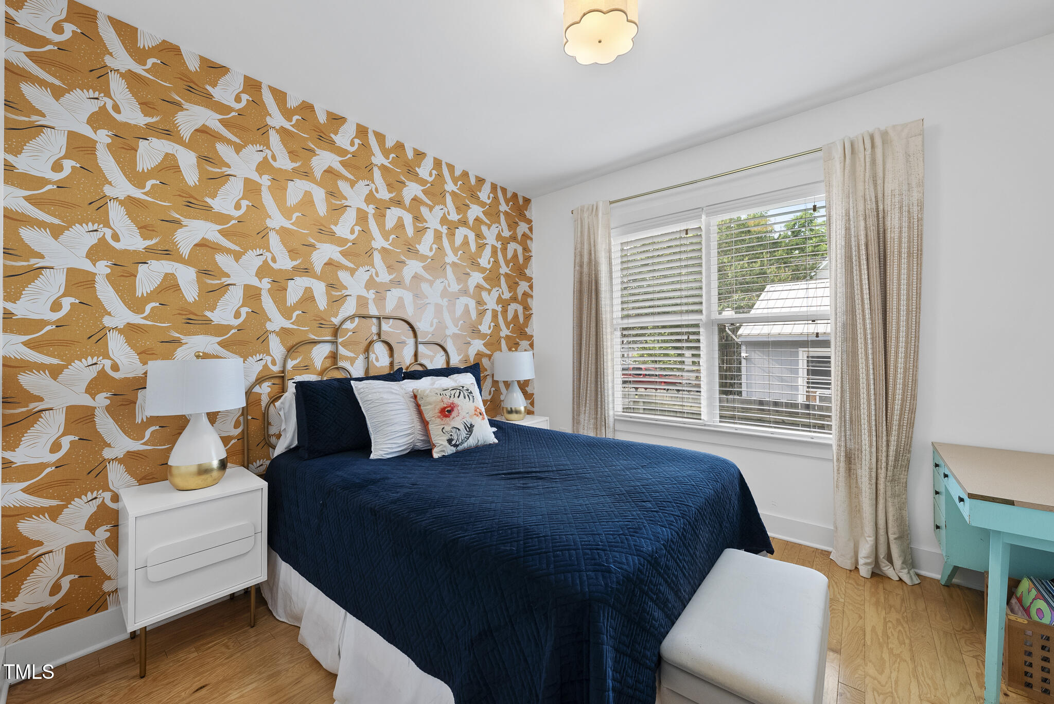 1010 South Person Street Raleigh, NC 27601 - Photo 13 of 41 a bedroom with a bed and a window