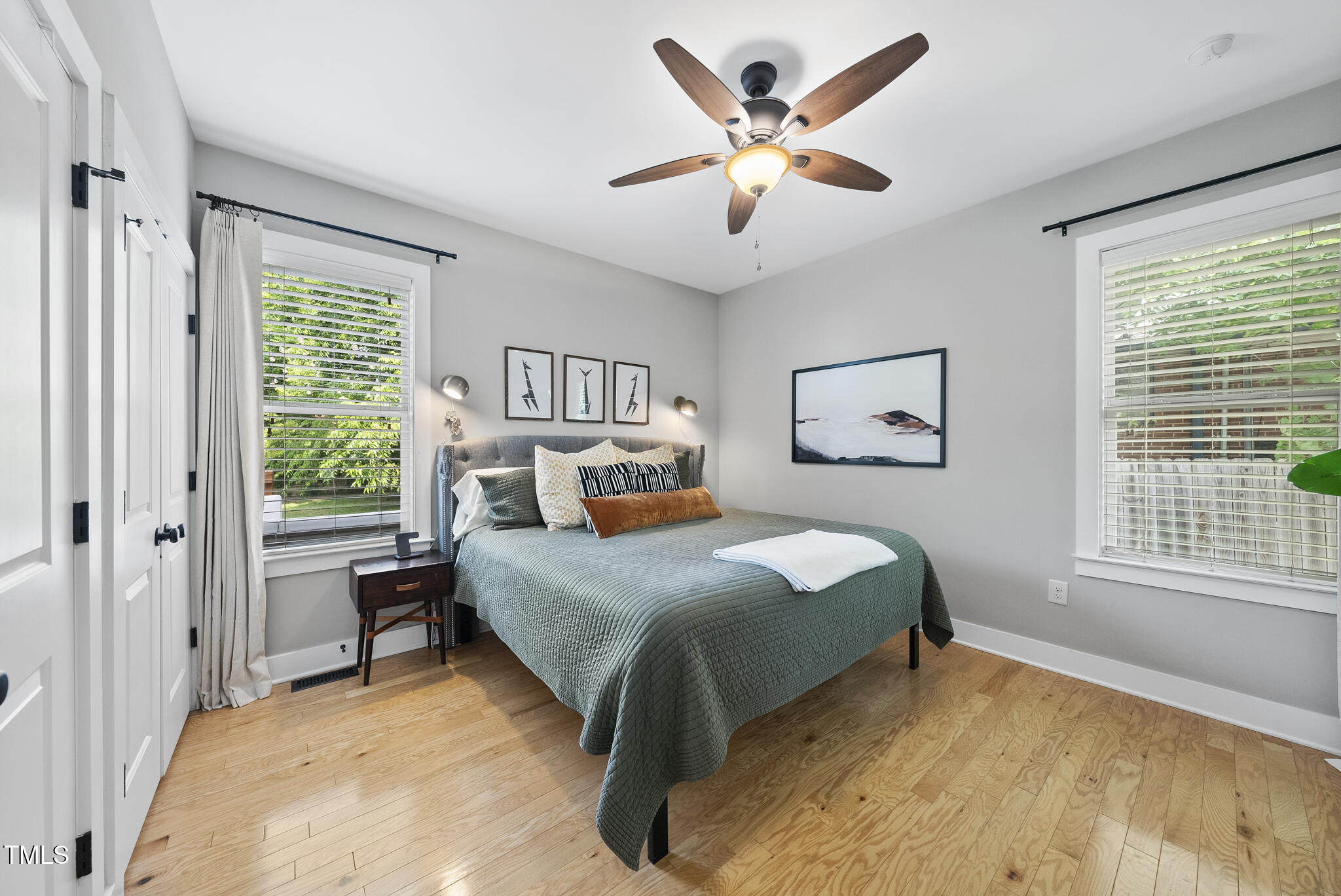 1010 South Person Street Raleigh, NC 27601 - Photo 15 of 41 a bedroom with a large bed and a window