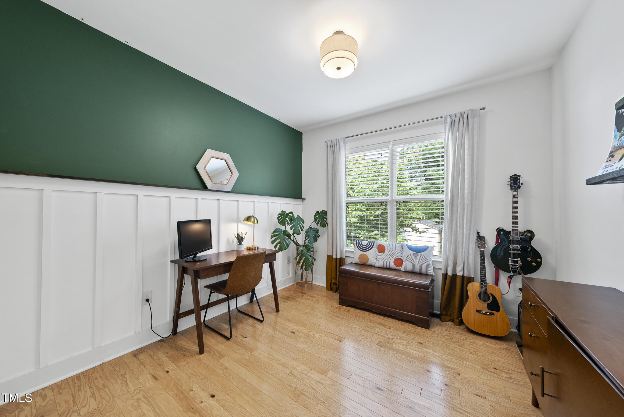 1010 South Person Street Raleigh, NC 27601 - Photo 18 of 41 a living room with furniture and a window