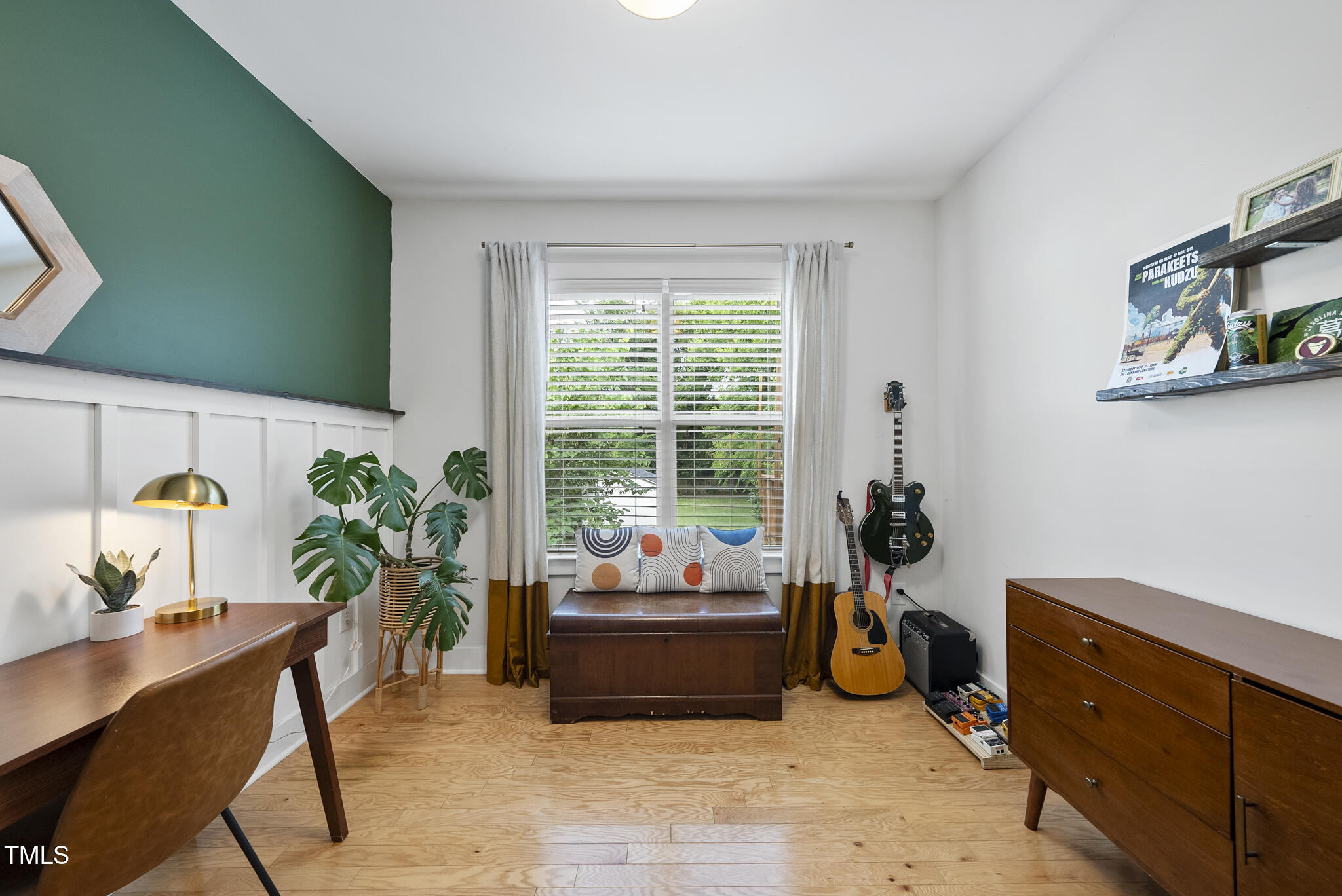 1010 South Person Street Raleigh, NC 27601 - Photo 19 of 41 a living room with furniture and a potted plant