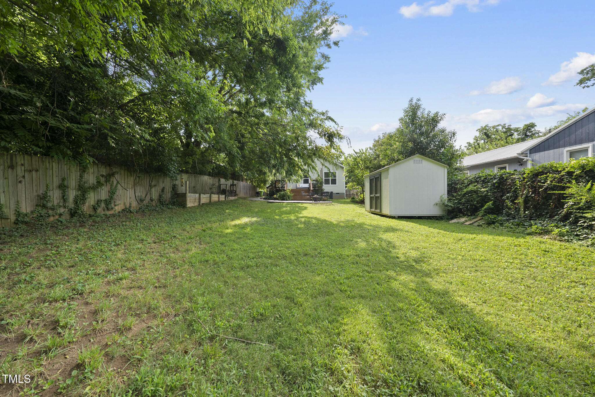 1010 South Person Street Raleigh, NC 27601 - Photo 28 of 41 a view of a backyard with a garden and plants