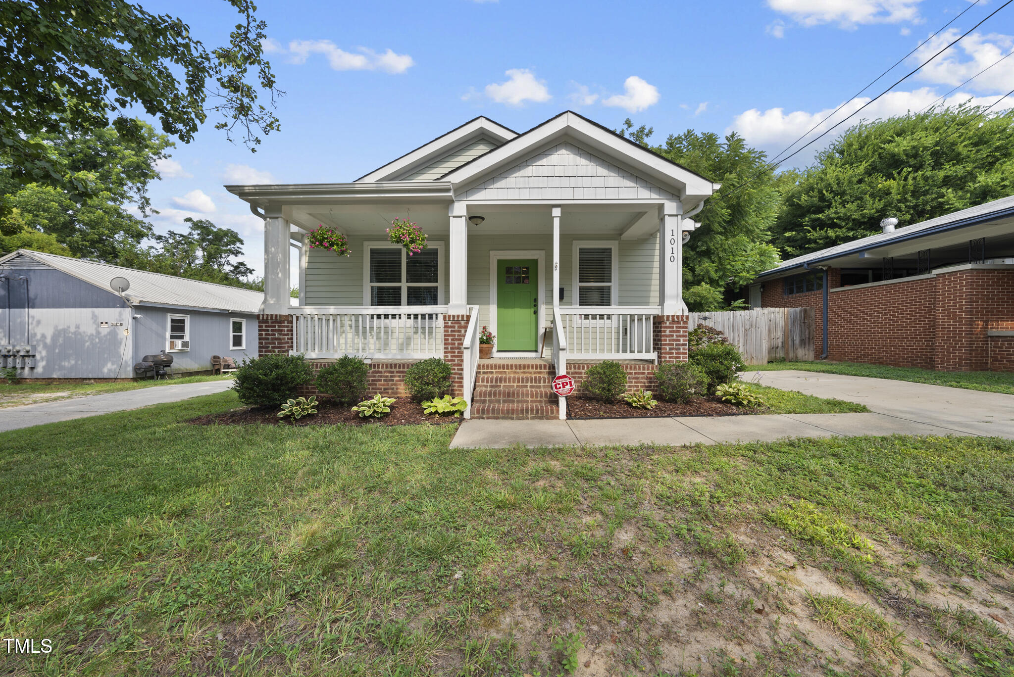 1010 South Person Street Raleigh, NC 27601 - Photo 29 of 41 a front view of a house with a yard and porch