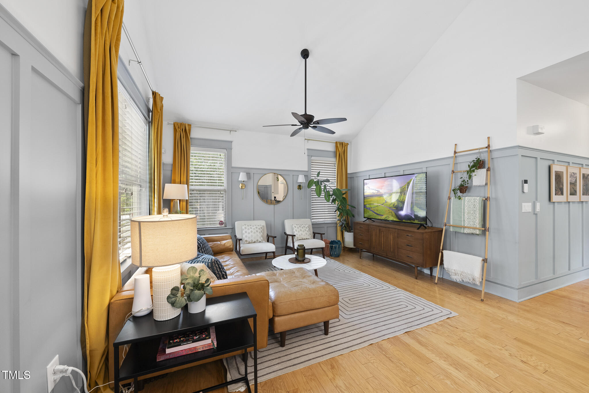 1010 South Person Street Raleigh, NC 27601 - Photo 2 of 41 a living room with furniture and a chandelier