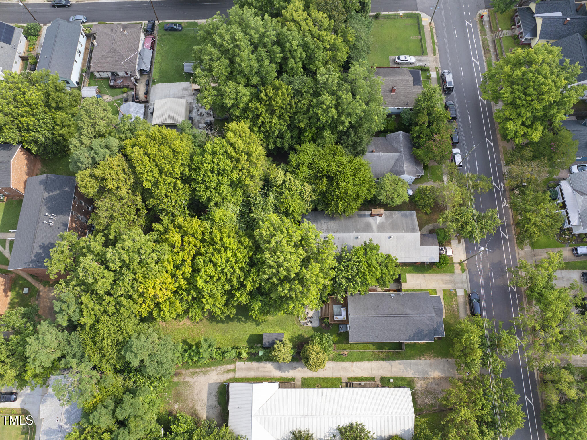 1010 South Person Street Raleigh, NC 27601 - Photo 33 of 41 an aerial view of a house with a garden and yard