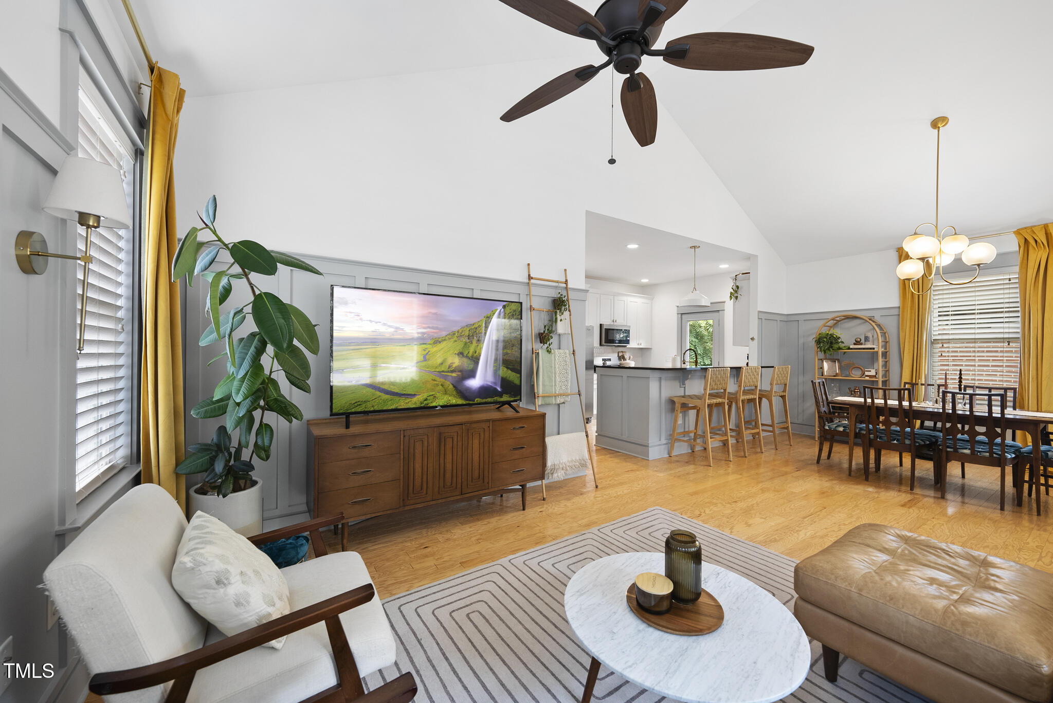 1010 South Person Street Raleigh, NC 27601 - Photo 5 of 41 a living room with furniture and a flat screen tv