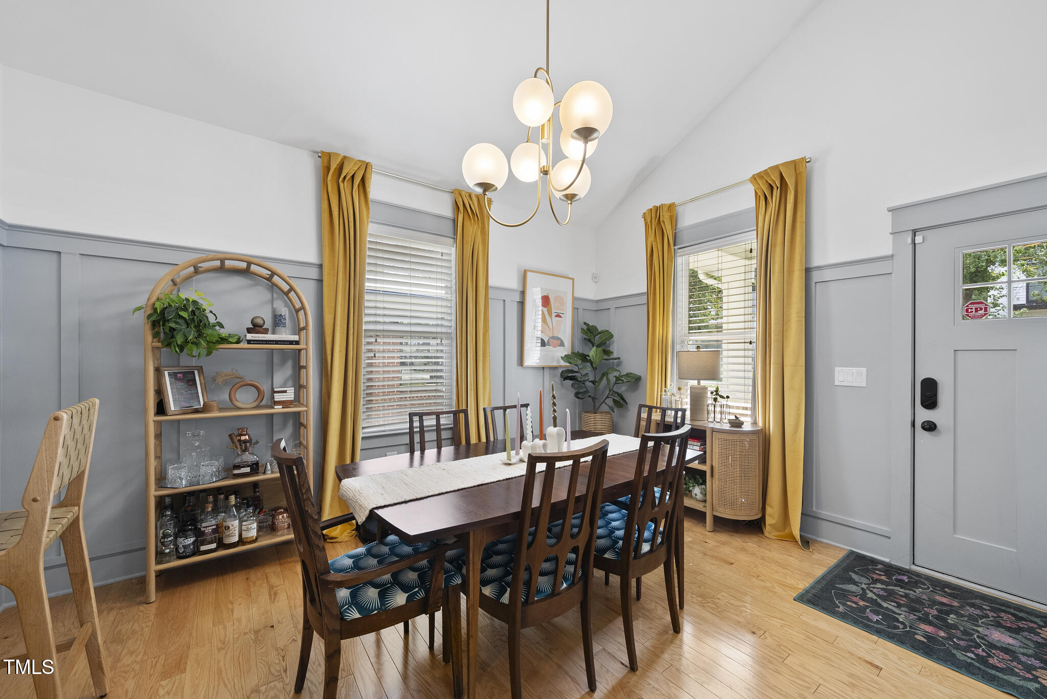 1010 South Person Street Raleigh, NC 27601 - Photo 7 of 41 a view of a dining room with furniture window and wooden floor