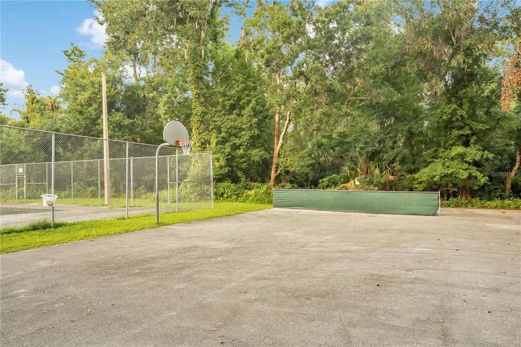 16 Raintree Court Ormond Beach, FL 32174 - Photo 34 of 37 a view of a park with large trees