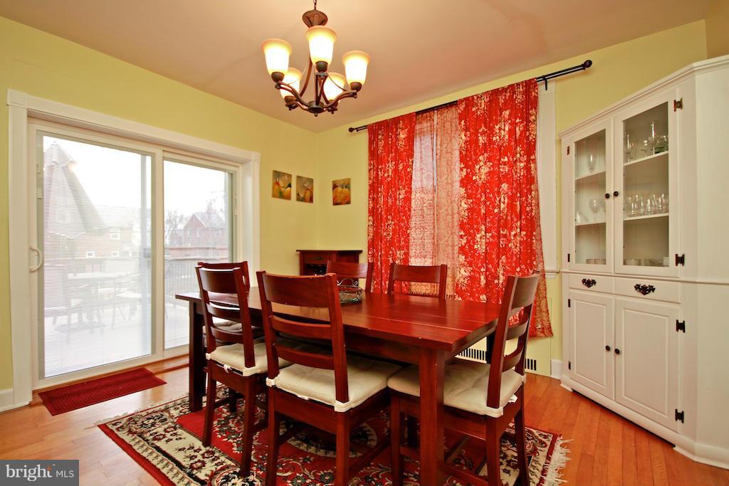 615 Anneslie Road Baltimore, MD 21212 - Photo 5 of 30 Dining Room with Sliders to Rear Deck
