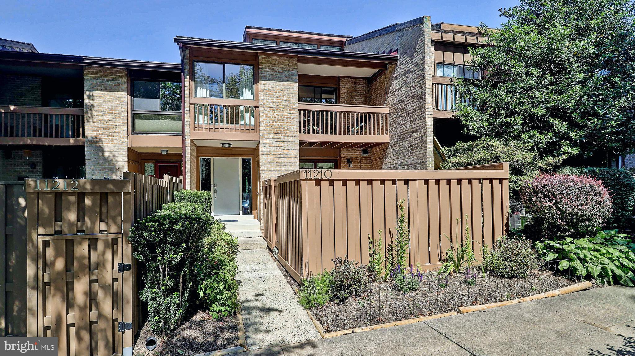 11210 Lagoon Lane Reston, VA 20191 - Photo 4 of 63 Front Elevation