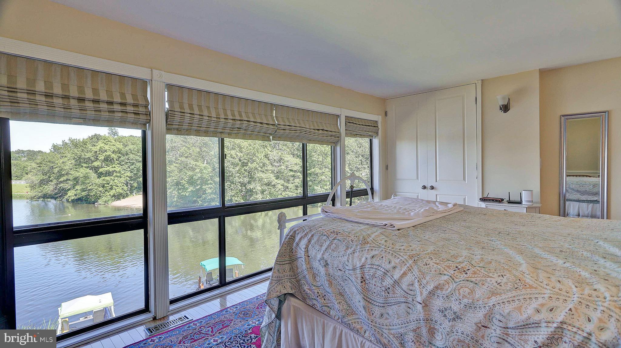 11210 Lagoon Lane Reston, VA 20191 - Photo 32 of 63 Master bedroom with view of lake