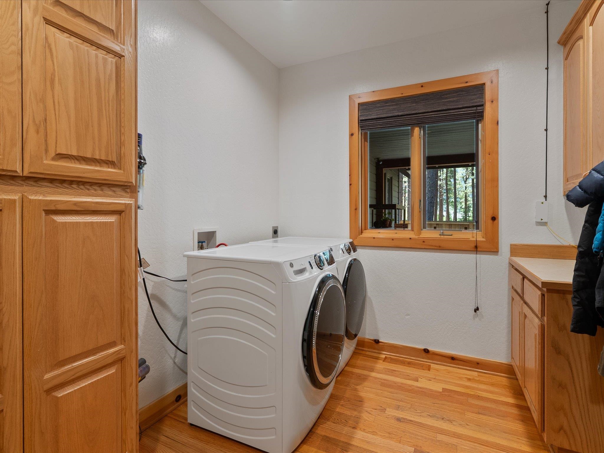 355 Quail View Circle Clio, CA 96106 - Photo 28 of 48 a utility room with dryer and washer