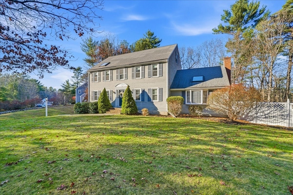 33 1st Parish Lane Hanover, MA 02339 - Photo 1 of 35 a view of a house with a big yard