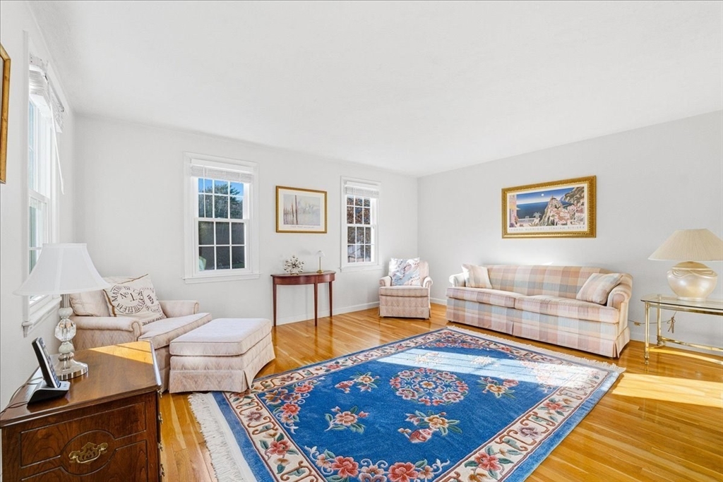 33 1st Parish Lane Hanover, MA 02339 - Photo 13 of 35 a living room with furniture and a rug