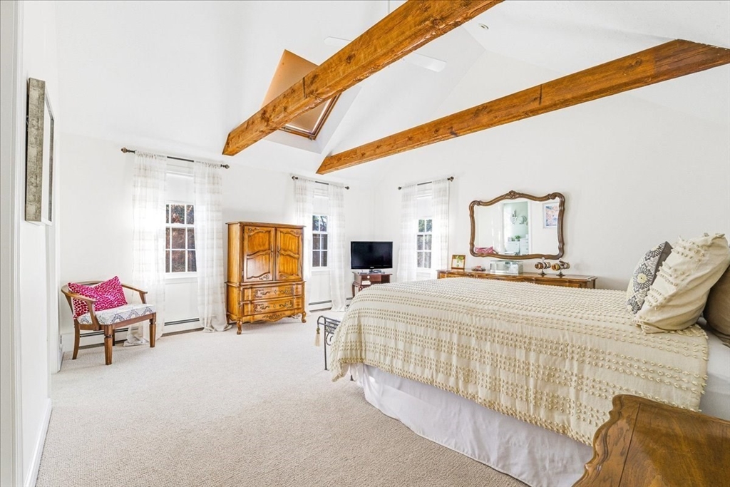 33 1st Parish Lane Hanover, MA 02339 - Photo 20 of 35 a bedroom with a bed and a couch