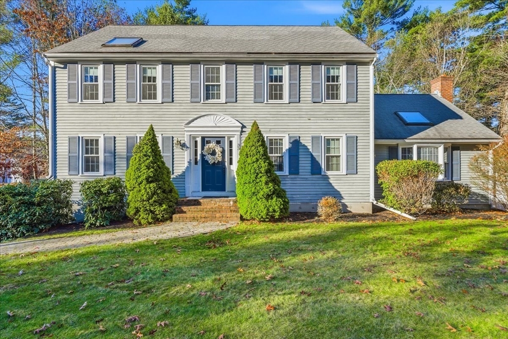 33 1st Parish Lane Hanover, MA 02339 - Photo 2 of 35 a front view of a house with a yard