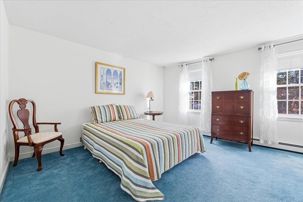 33 1st Parish Lane Hanover, MA 02339 - Photo 23 of 35 a bedroom with a bed and a dresser