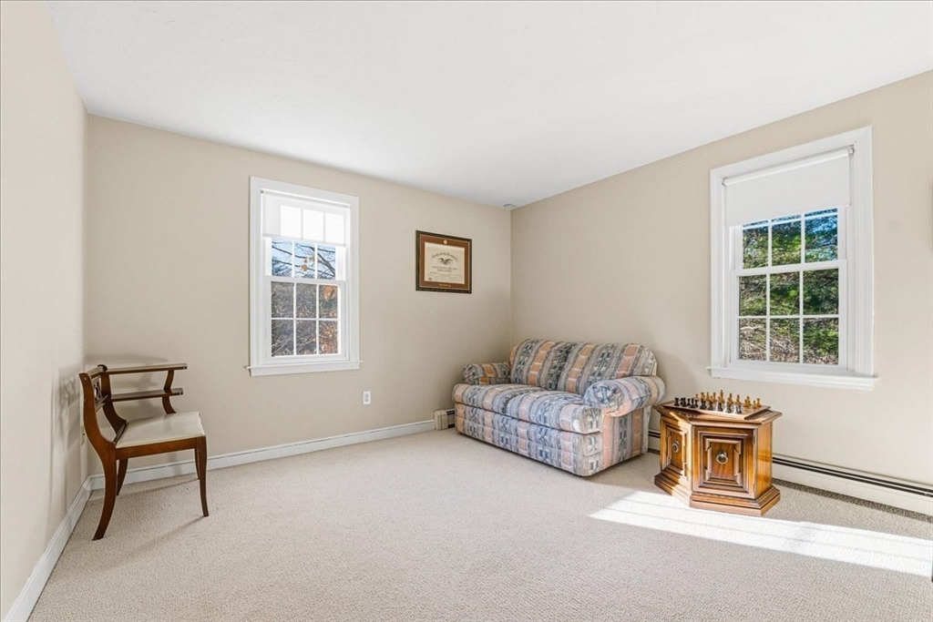 33 1st Parish Lane Hanover, MA 02339 - Photo 27 of 35 a living room with furniture and a window