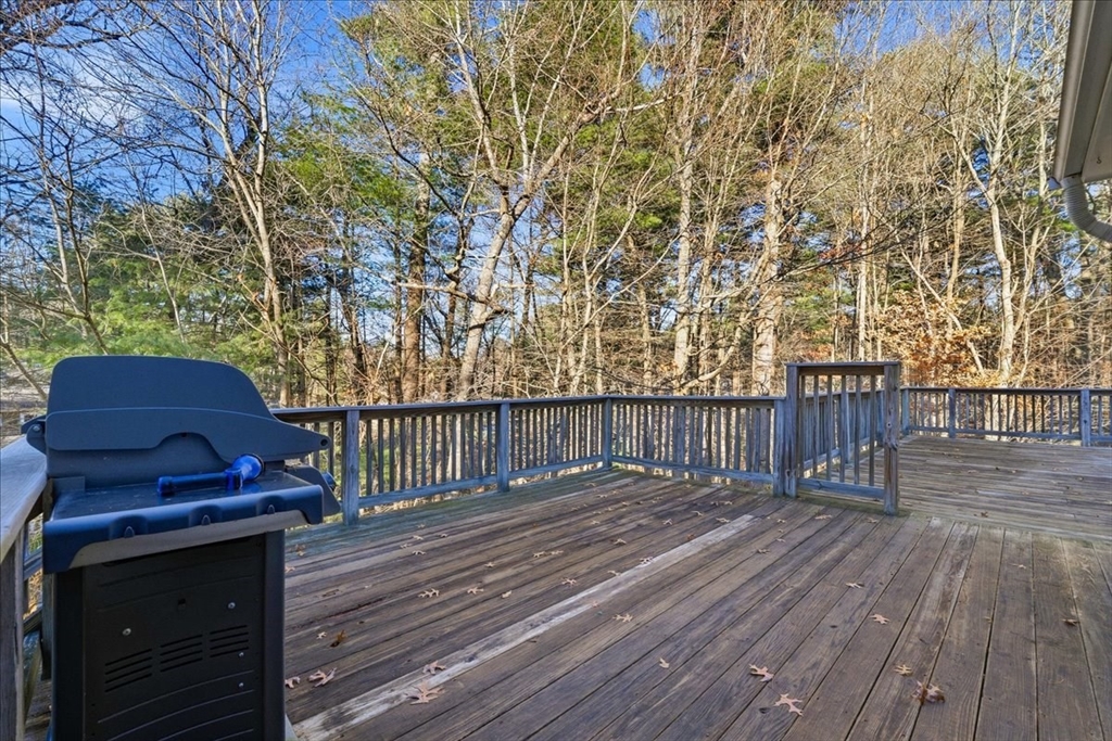 33 1st Parish Lane Hanover, MA 02339 - Photo 30 of 35 a view of deck with wooden floor and fence