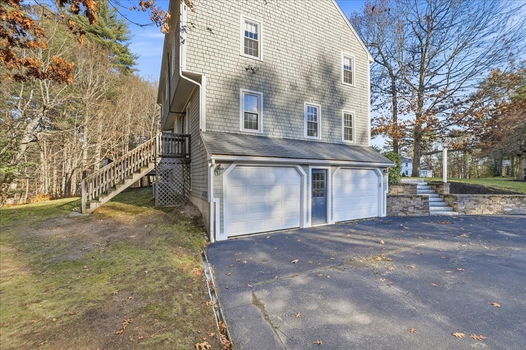 33 1st Parish Lane Hanover, MA 02339 - Photo 31 of 35 a view of a house with a yard