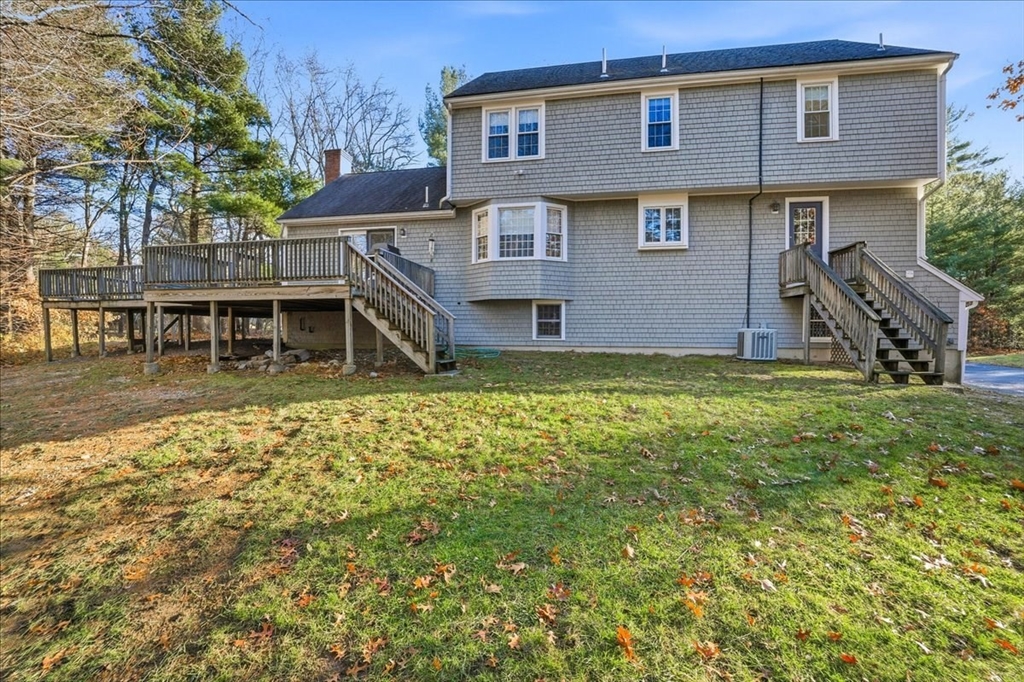 33 1st Parish Lane Hanover, MA 02339 - Photo 32 of 35 a view of a house with a yard