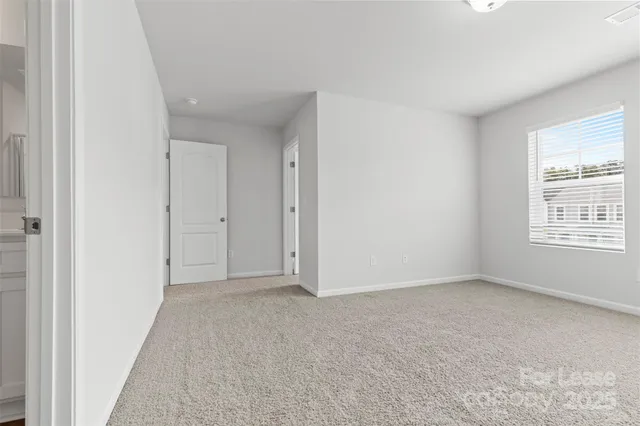 a sink with white cabinets