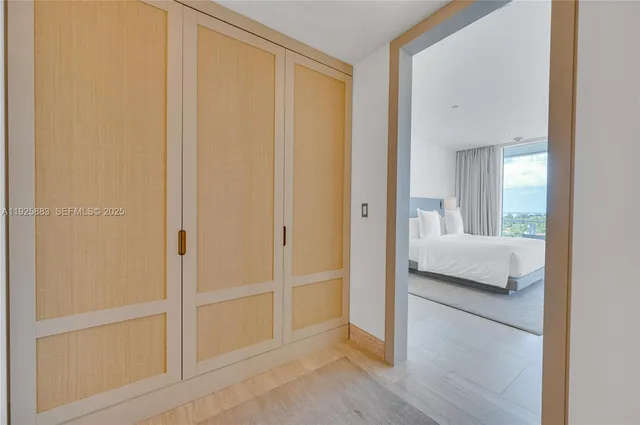 a view of a bathroom from a hallway