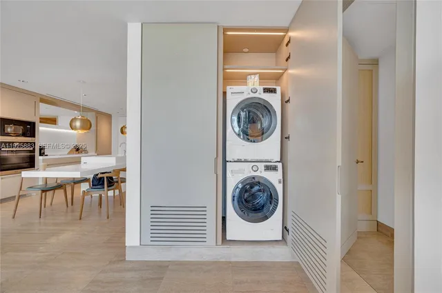 a view of a kitchen washer and dryer